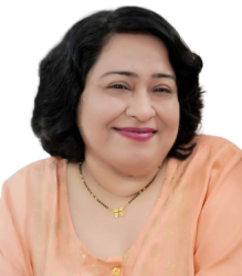 Dr. Abha Khetrapal , wearing a light color kurta and a pendant with short hair is smiling at the camera.