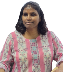 Image of Ms. Namrata Mehta, wearing a pink and white strip kurti with half tied hair