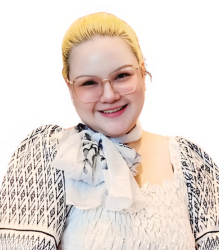 Image of Ms. Thitiphorn Prawatsrichai, wearing a white and black color top with a neat bun.